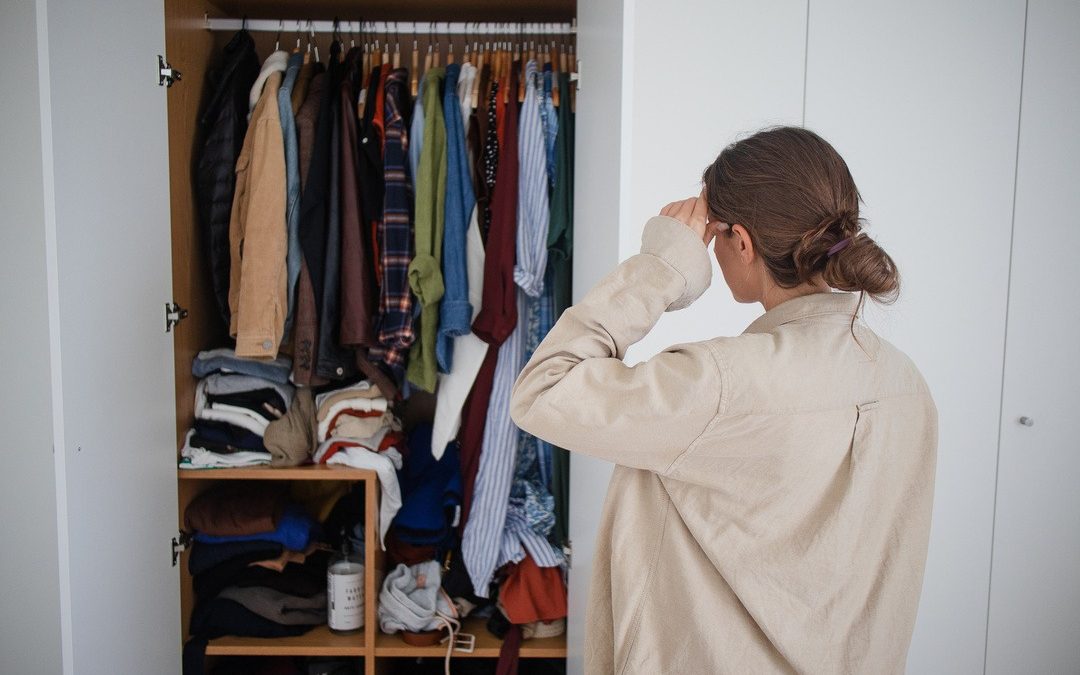 Cluttered Closet Messy Chaos Overwhelmed Woman