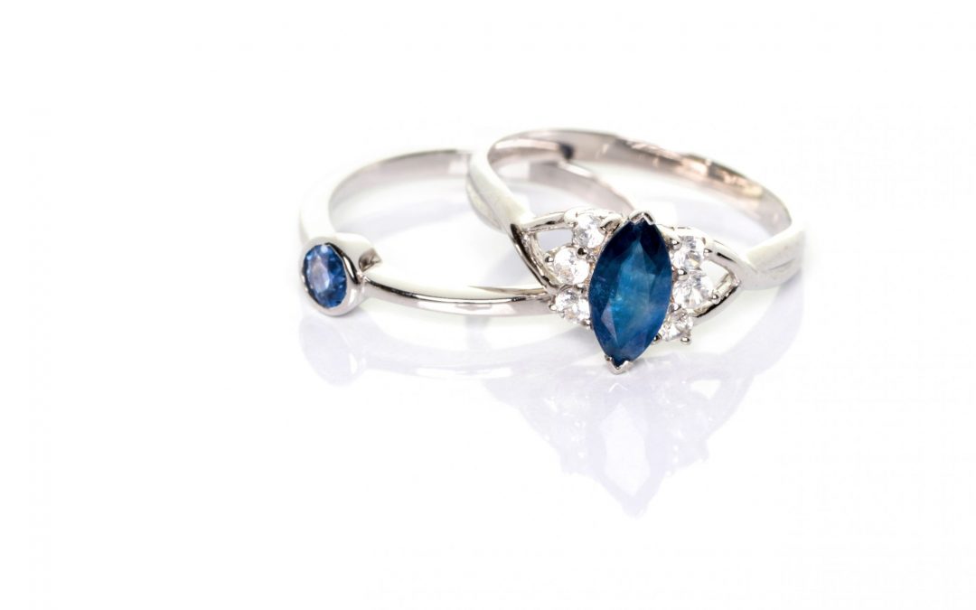 Blue Sapphire with diamonds Jewel or gems ring on white backgrou