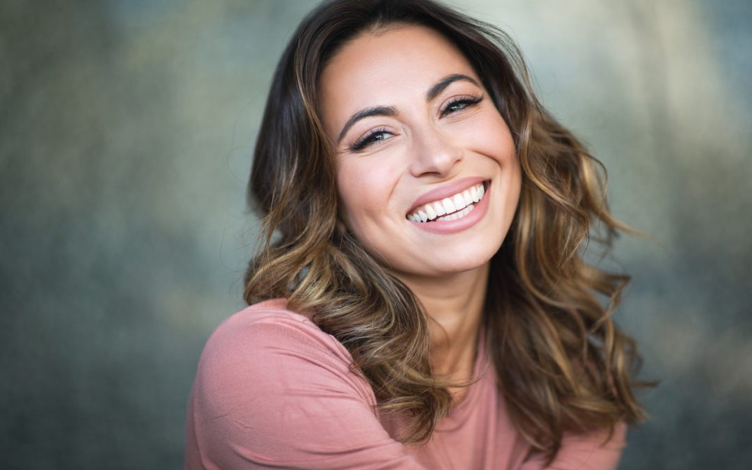 Close up happy laughing young woman